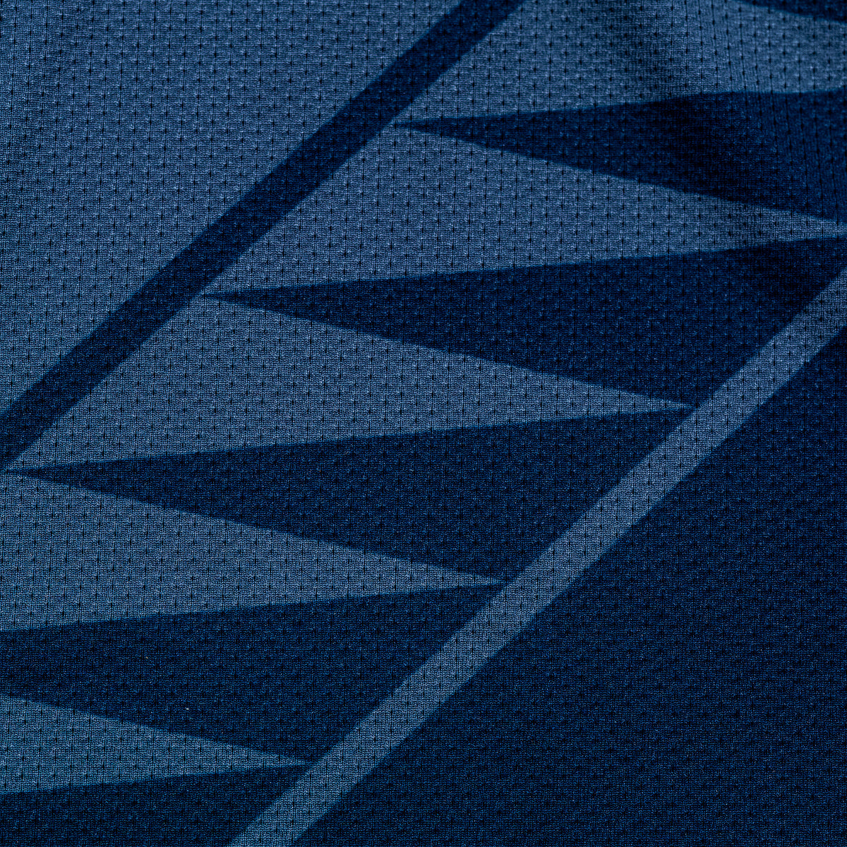 Inspired by the Oklahoma River that binds the north and south sides of our city, water-like teeth bridge the duotone colors, uniting both halves of the jersey into one.
