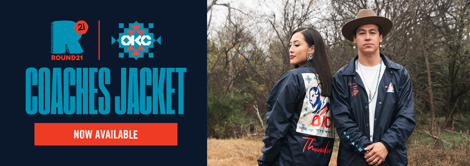 Two people wearing 'Round21 Coaches Jacket' with OKC branding outdoors.