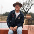Model Wearing OKC Thunder X Round21 Native Heritage Coaches Jacket in Navy - Front View 