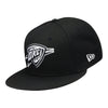 OKC THUNDER NEW ERA 950 BLACK AND WHITE CORE SNAPBACK IN BLACK - FRONT LEFT VIEW