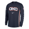 2025-26 CITY EDITION OKC THUNDER NIKE LONG SLEEVE PREGAME TOP in Navy - Front View