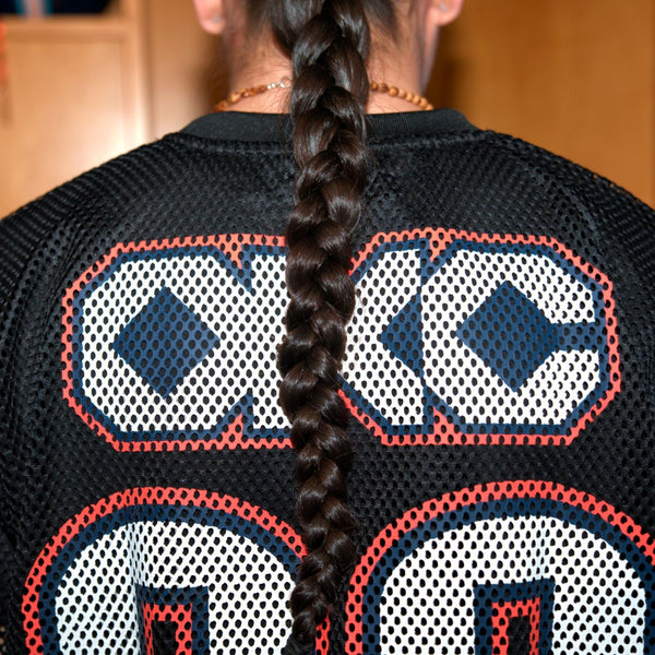 Models wearing OKC Thunder X Round21 Native Heritage Mesh Top