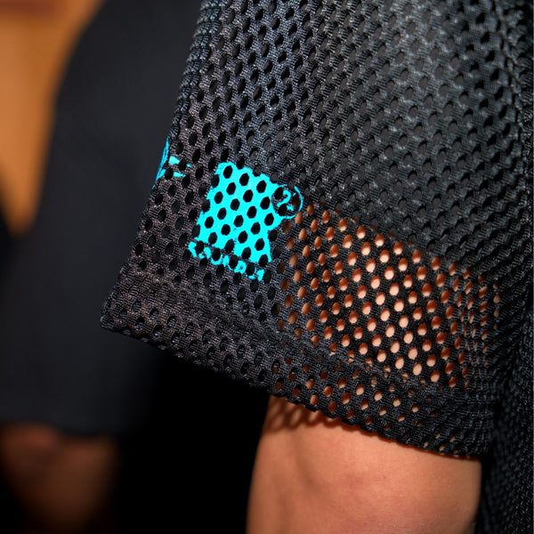 Model wearing OKC Thunder X Round21 Native Heritage Mesh Top