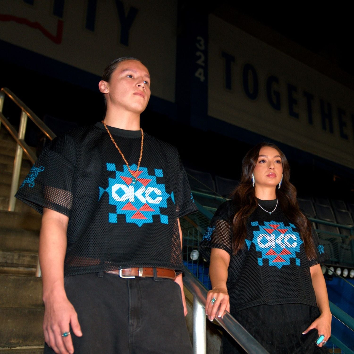 Models wearing OKC Thunder X Round21 Native Heritage Mesh Top