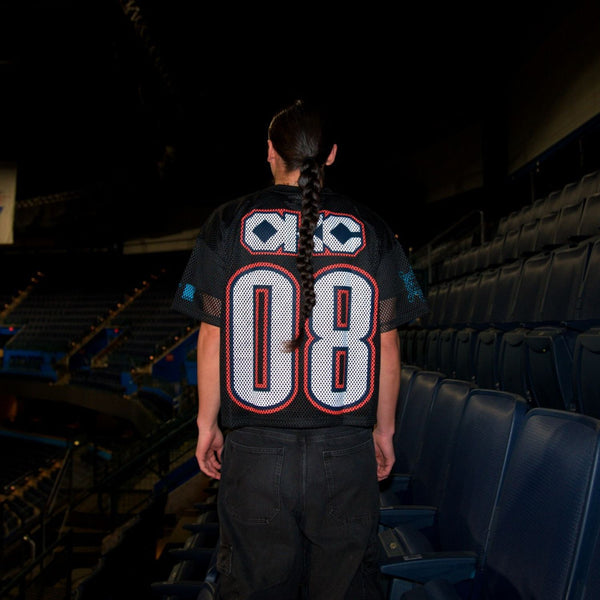 Models wearing OKC Thunder X Round21 Native Heritage Mesh Top