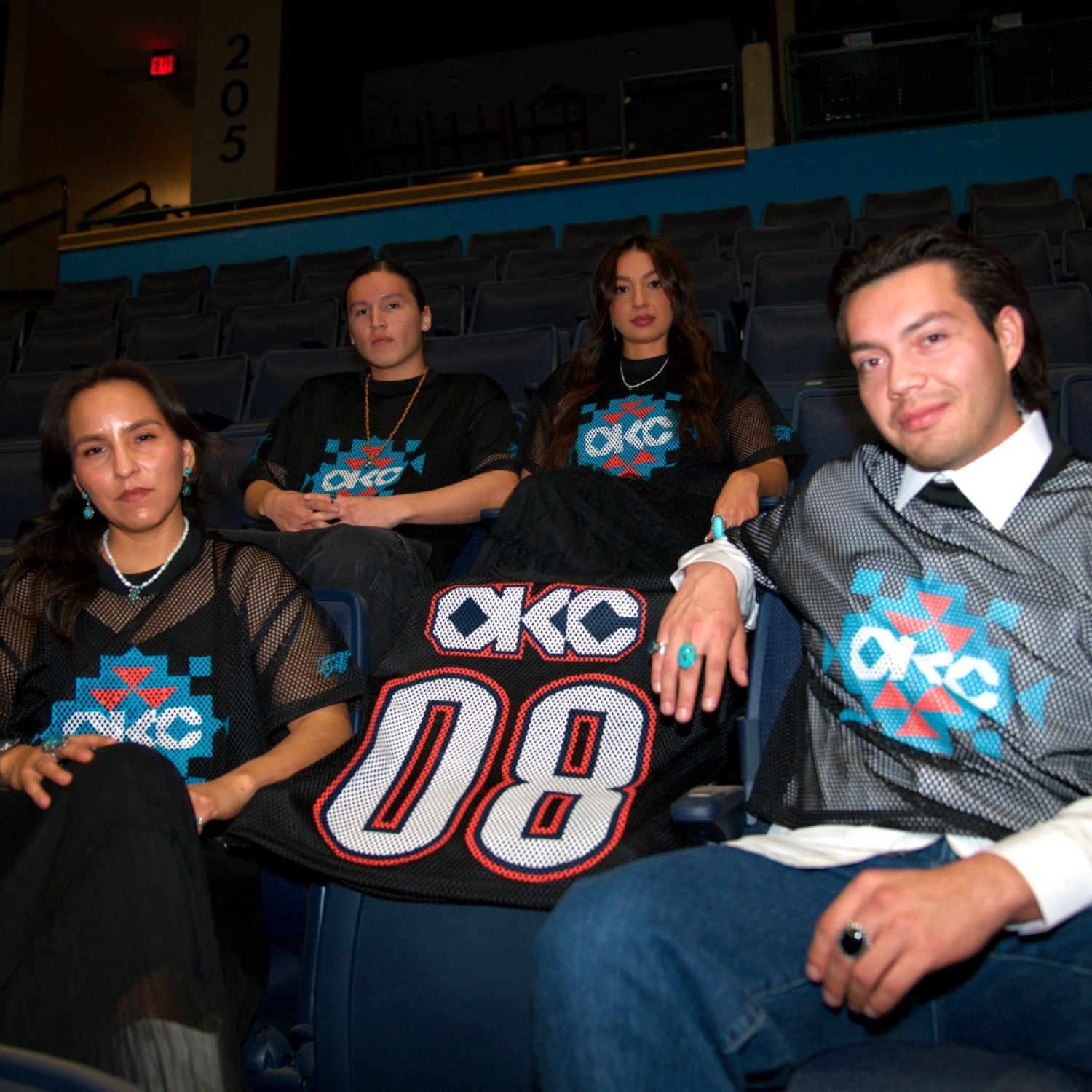 Models wearing OKC Thunder X Round21 Native Heritage Mesh Top