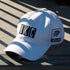 LOUD & LOYAL x OKLAHOMA CITY THUNDER "CUT FROM A DIFFERENT CLOTH" ADJUSTABLE HAT IN WHITE - LIFESTYLE ANGLED LEFT SIDE VIEW